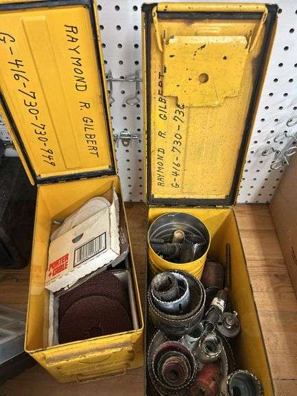 Two Yellow Ammo Boxes with Hole Saw Blades and Porter-Cable Sanding Discs