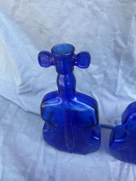 Collection of Violin Shaped Glass Bottles
