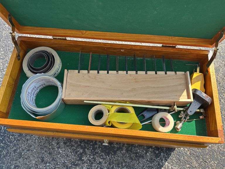 Wooden Tool Chest with Various Tools and Supplies