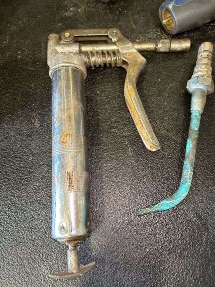 Assorted Tools: Grease Gun, Torches, and Oil Cans