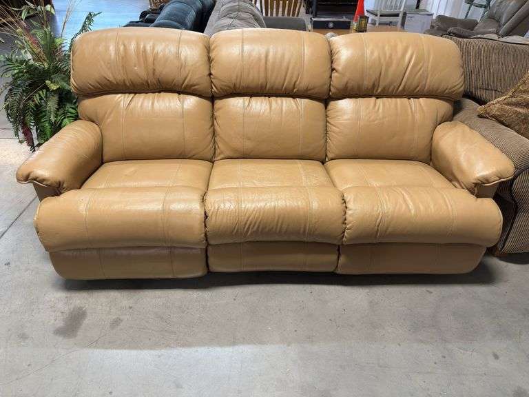 Tan Leather Three-Seat Reclining Sofa image