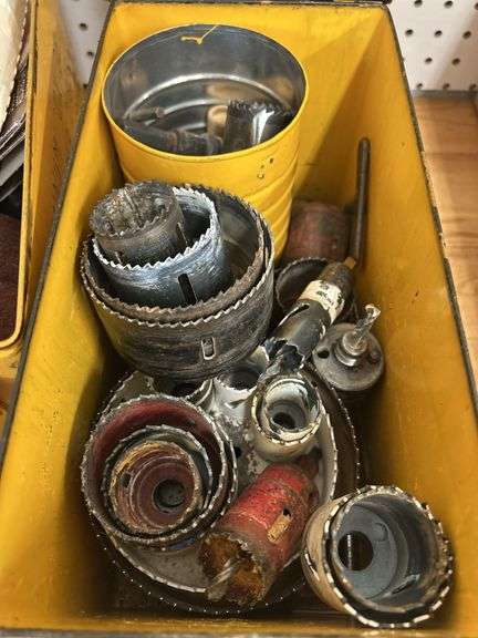 Two Yellow Ammo Boxes with Hole Saw Blades and Porter-Cable Sanding Discs