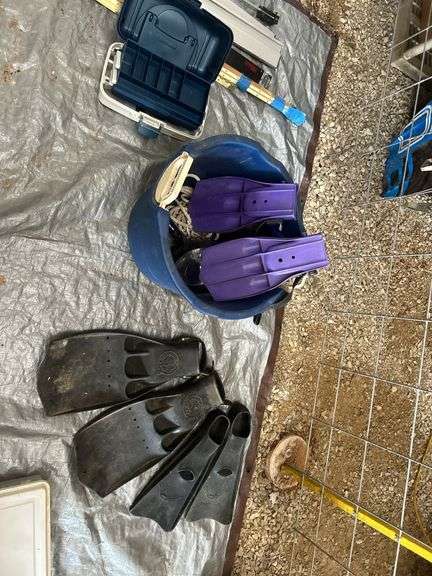 Bucket of Scuba Diving Fins and Plano Tackle Box image
