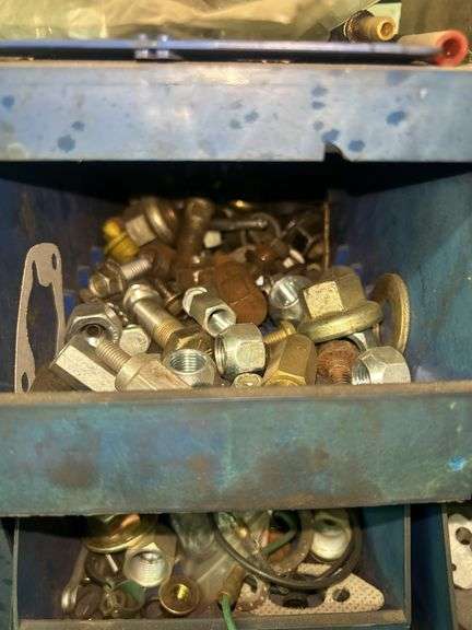 Blue Metal Tool Cabinet with Automotive Hardware and Parts