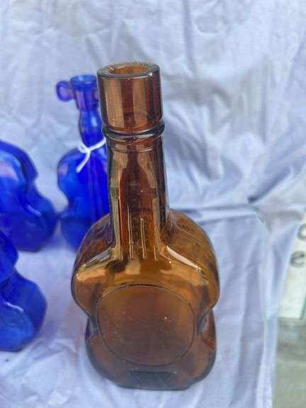 Collection of Violin Shaped Glass Bottles