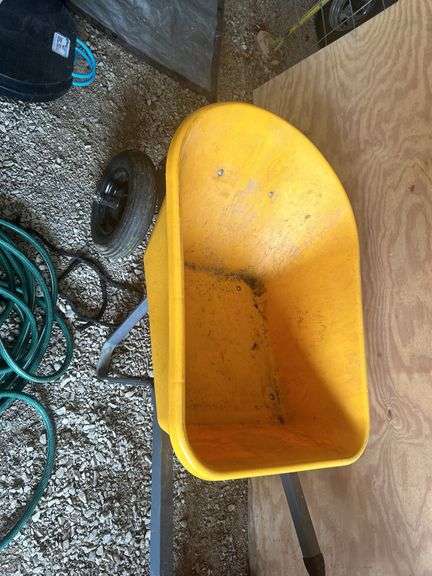 Yellow Wheelbarrow and Hoses image