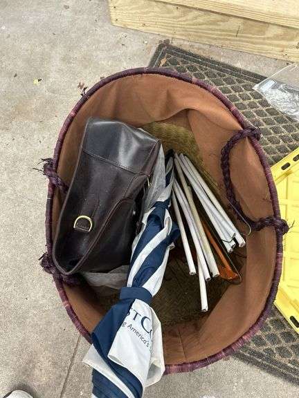 Wicker Basket with Purse, Umbrella, and Hangers image