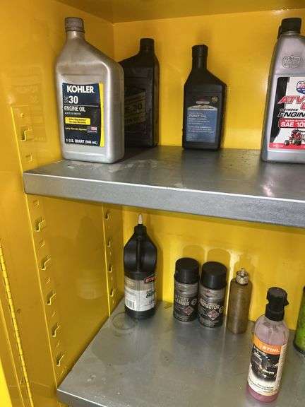 Justrite Flammable Liquid Storage Cabinet with Assorted Fluids and Supplies