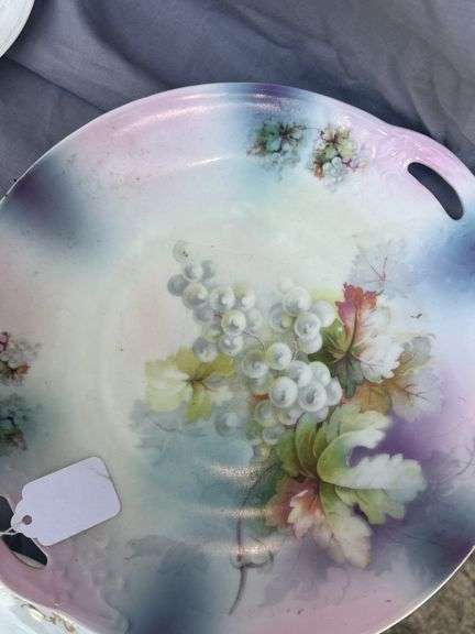 Collection of Decorative Plates with Floral Designs