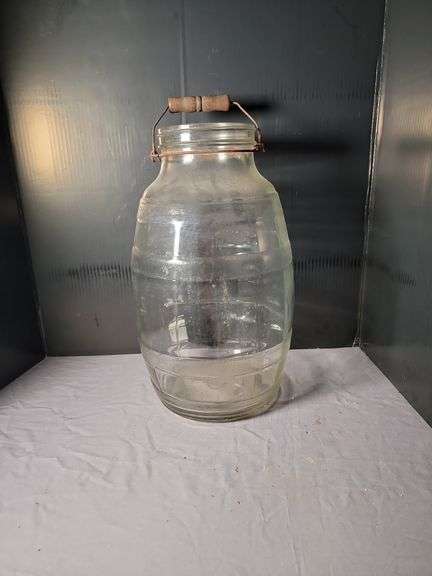 Large Glass Jar with Metal and Wood Handle image