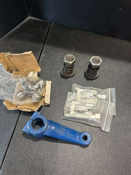 Assorted Agricultural Equipment Parts - Axle Bolt, Repair Kit, and More image