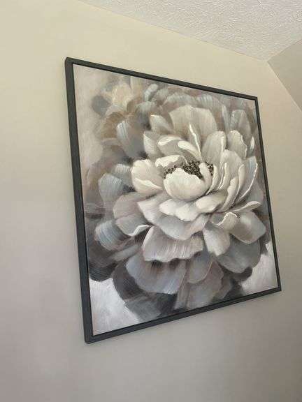 Framed Floral Wall Art and Oversized Roman Numeral Wall Clock image