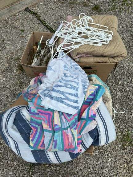 Assorted Household Linens, Towels, and Clothing Hangers image