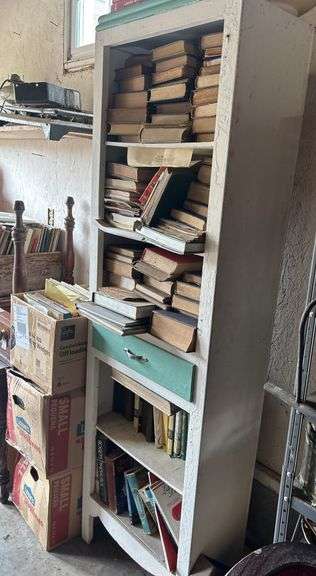 Bookshelf with Books and Boxes of Books image
