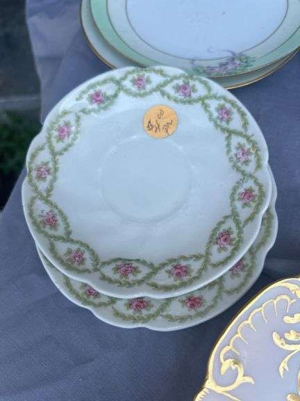 Collection of Decorative Plates with Floral Designs