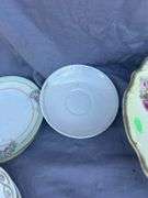 Collection of Decorative Plates with Floral Designs