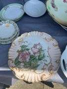 Collection of Decorative Plates with Floral Designs