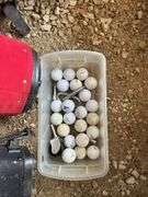 Two Golf Bags with Golf Balls