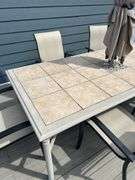 Tile Top Patio Dining Set with 6 Chairs and Umbrella