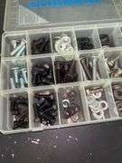 Shimano Hardware Assortment: Nuts, Bolts, and Washers in Organizer Cases