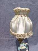 Figural Lamp with Satin Shade
