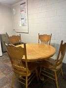 Round Oak Table and Four Spindle Back Chairs
