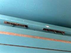 Repurposed Player Piano with Stained Glass Sailboat Windows