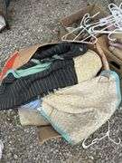 Assorted Household Linens, Towels, and Clothing Hangers