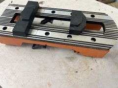 Orange and Silver Colored Vise