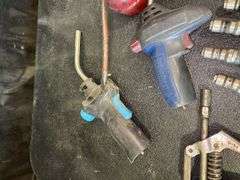 Assorted Tools: Grease Gun, Torches, and Oil Cans