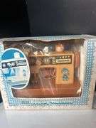 Toy Sewing Machine, Fisher Price Clock, and Bead Toy