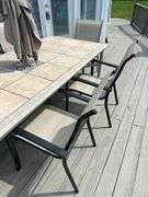 Tile Top Patio Dining Set with 6 Chairs and Umbrella
