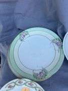 Collection of Decorative Plates with Floral Designs
