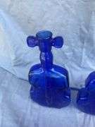 Collection of Violin Shaped Glass Bottles