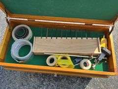 Wooden Tool Chest with Various Tools and Supplies