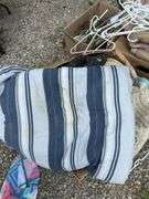 Assorted Household Linens, Towels, and Clothing Hangers