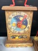 Toy Sewing Machine, Fisher Price Clock, and Bead Toy