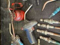 Assorted Tools: Grease Gun, Torches, and Oil Cans