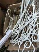 Assorted Household Linens, Towels, and Clothing Hangers