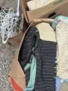 Assorted Household Linens, Towels, and Clothing Hangers