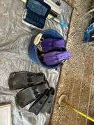 Bucket of Scuba Diving Fins and Plano Tackle Box