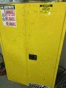 Justrite Flammable Liquid Storage Cabinet with Assorted Fluids and Supplies