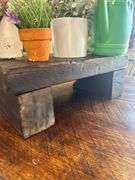 Rustic Wooden Display Riser with Assorted Decorative Items