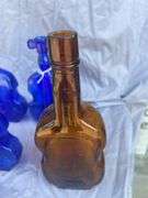 Collection of Violin Shaped Glass Bottles