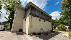 Two Story Garage Building & Lot