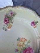 Collection of Decorative Plates with Floral Designs