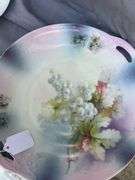 Collection of Decorative Plates with Floral Designs