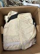 Assorted Household Linens, Towels, and Clothing Hangers