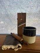 Vintage Kitchenware Set: Rolling Pin, Cabbage Cutter, Stoneware Crock, and Decorative Cloth