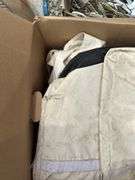 Assorted Household Linens, Towels, and Clothing Hangers